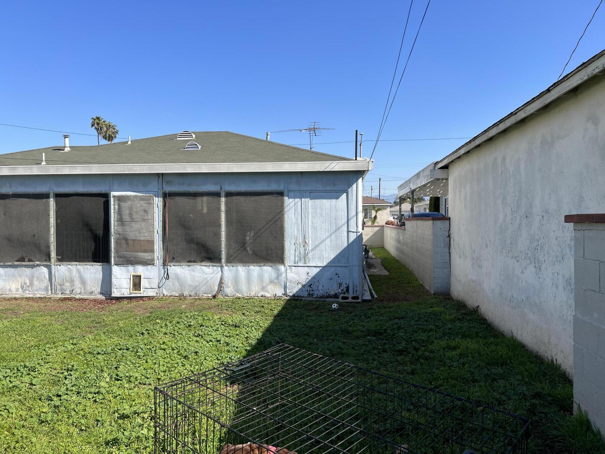 4916 Brompton Avenue Bell, CA 90201 - Photo 41 of 50 a view of a house with a yard