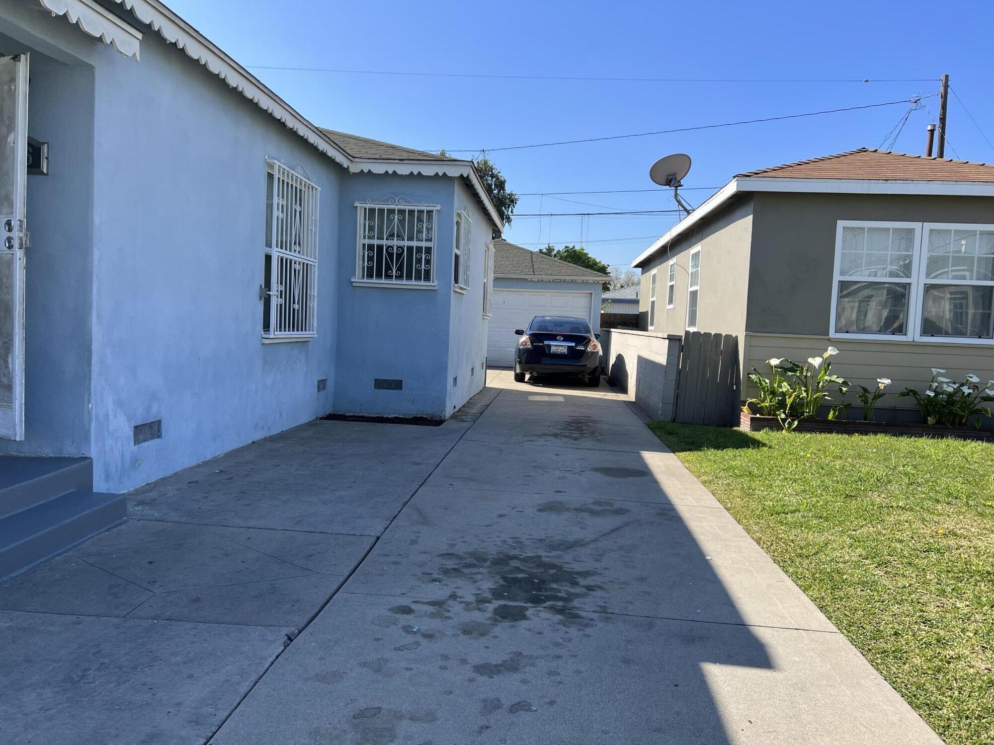 4916 Brompton Avenue Bell, CA 90201 - Photo 45 of 50 a view of a house with backyard and garden