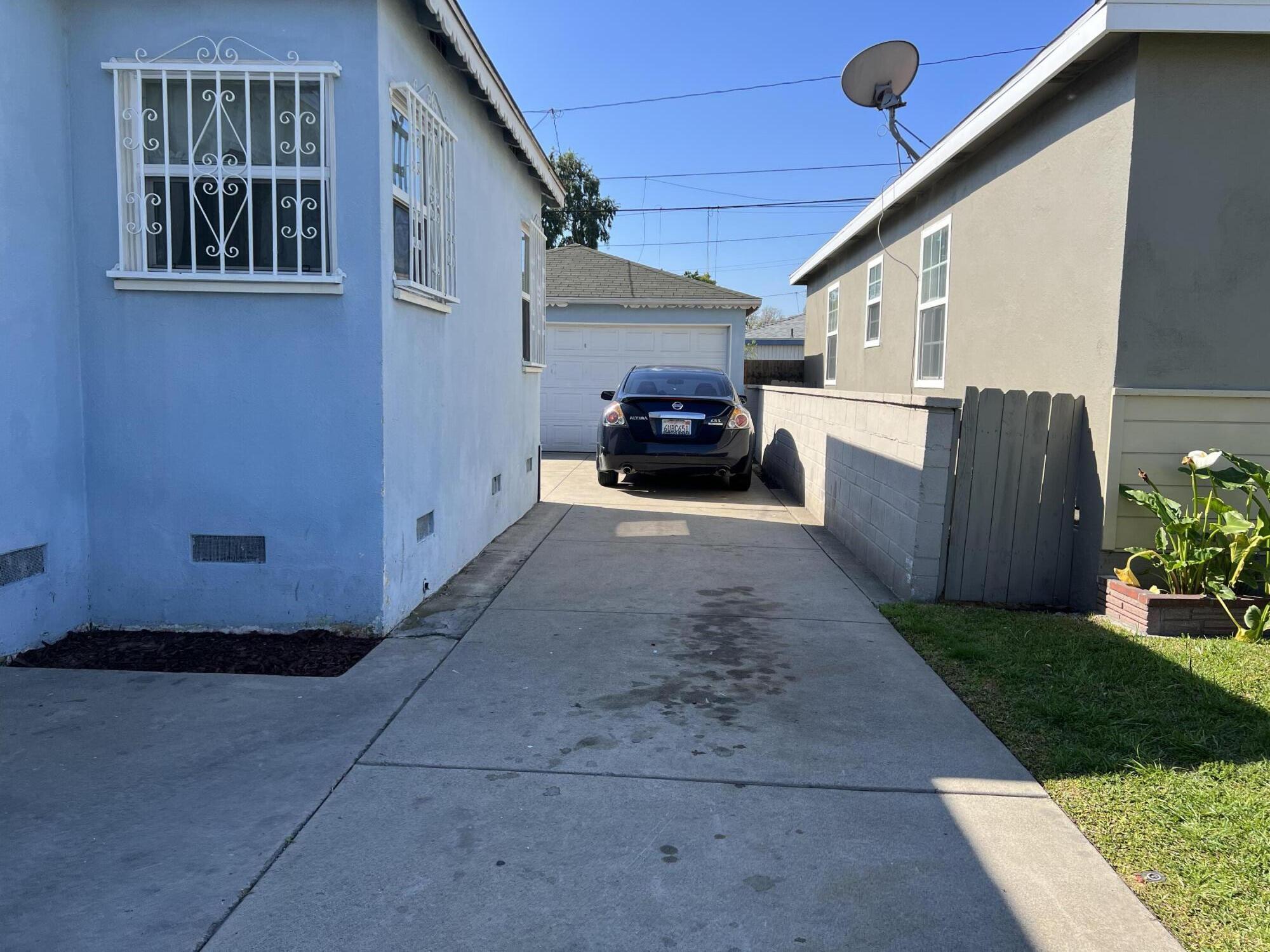 4916 Brompton Avenue Bell, CA 90201 - Photo 46 of 50 a view of a patio with table and chairs