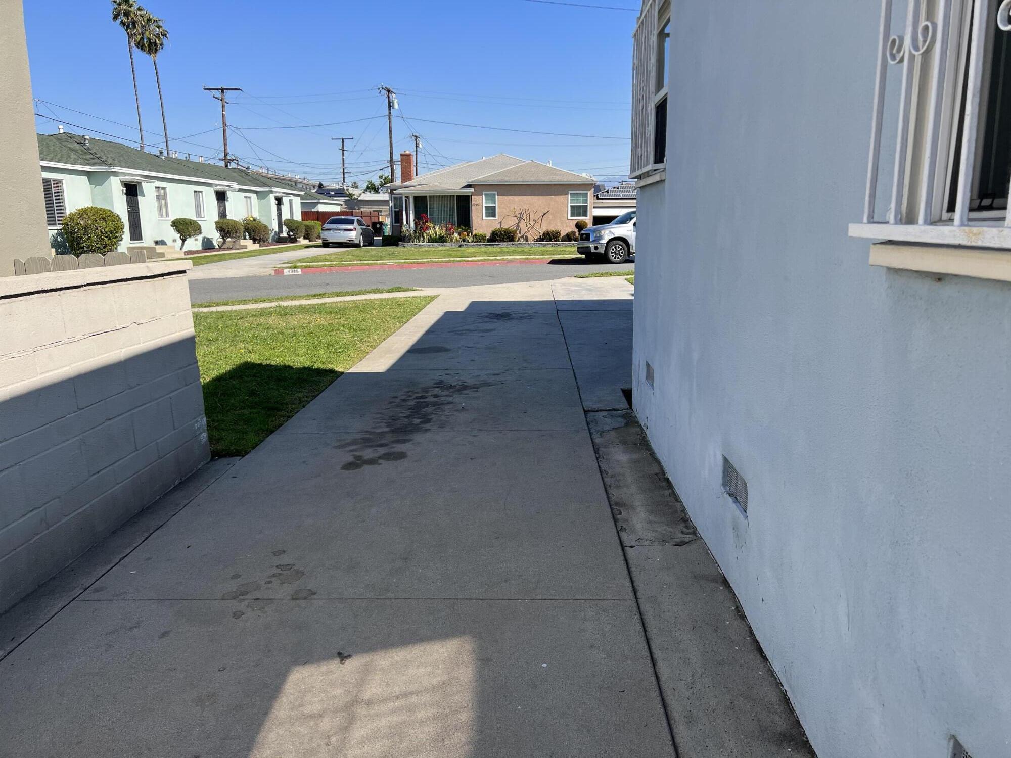 4916 Brompton Avenue Bell, CA 90201 - Photo 47 of 50 a view of a kitchen with a sink and cabinets