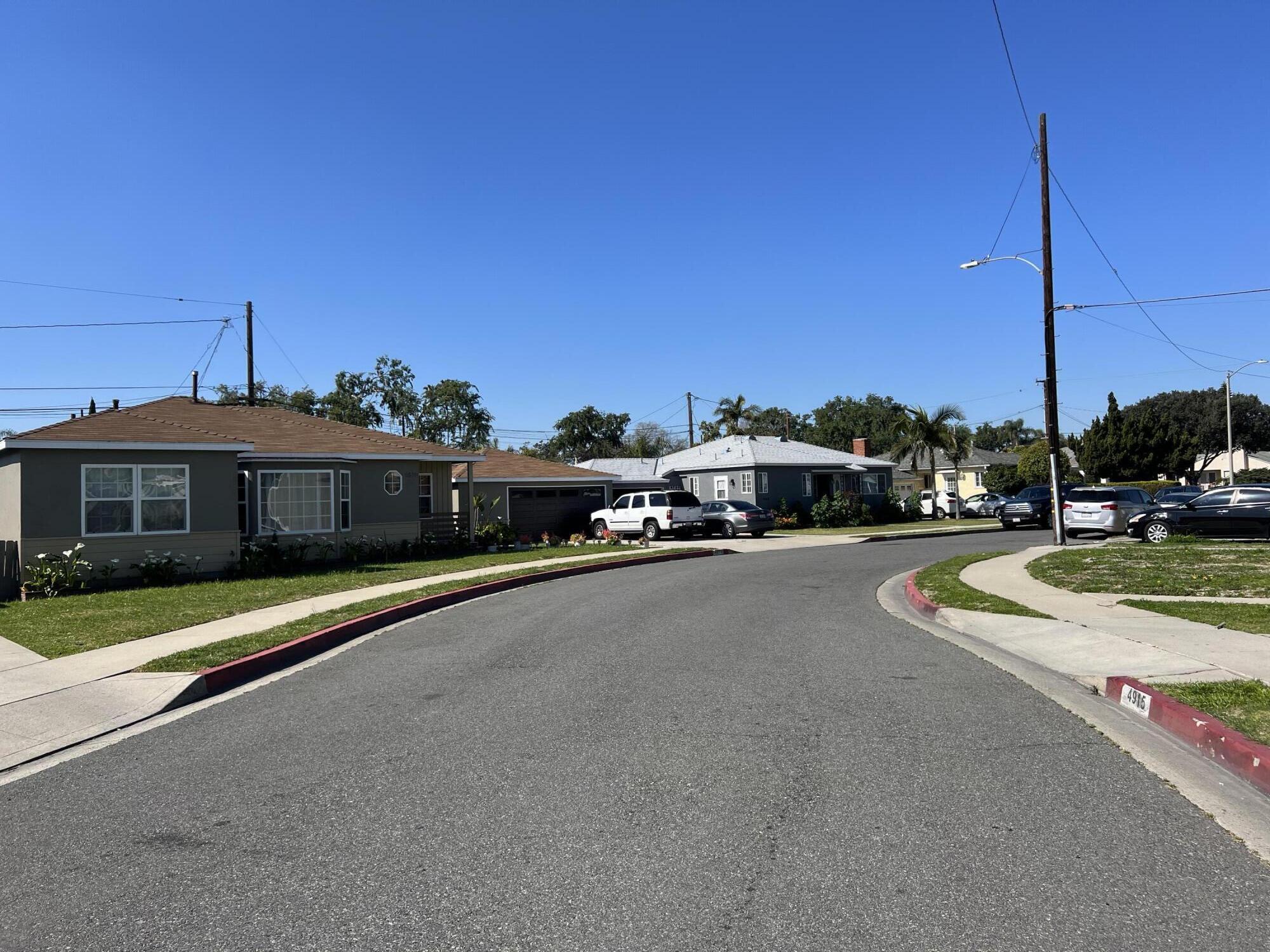 4916 Brompton Avenue Bell, CA 90201 - Photo 50 of 50 a view of a city street with tall buildings