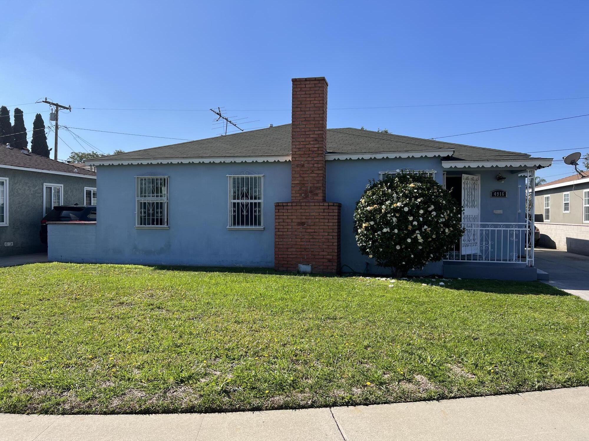 4916 Brompton Avenue Bell, CA 90201 - Photo 8 of 50 a view of a back yard of the house