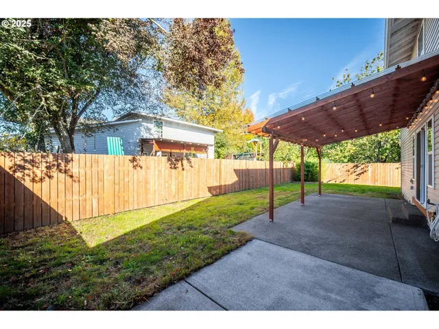 a view of a backyard with a garden