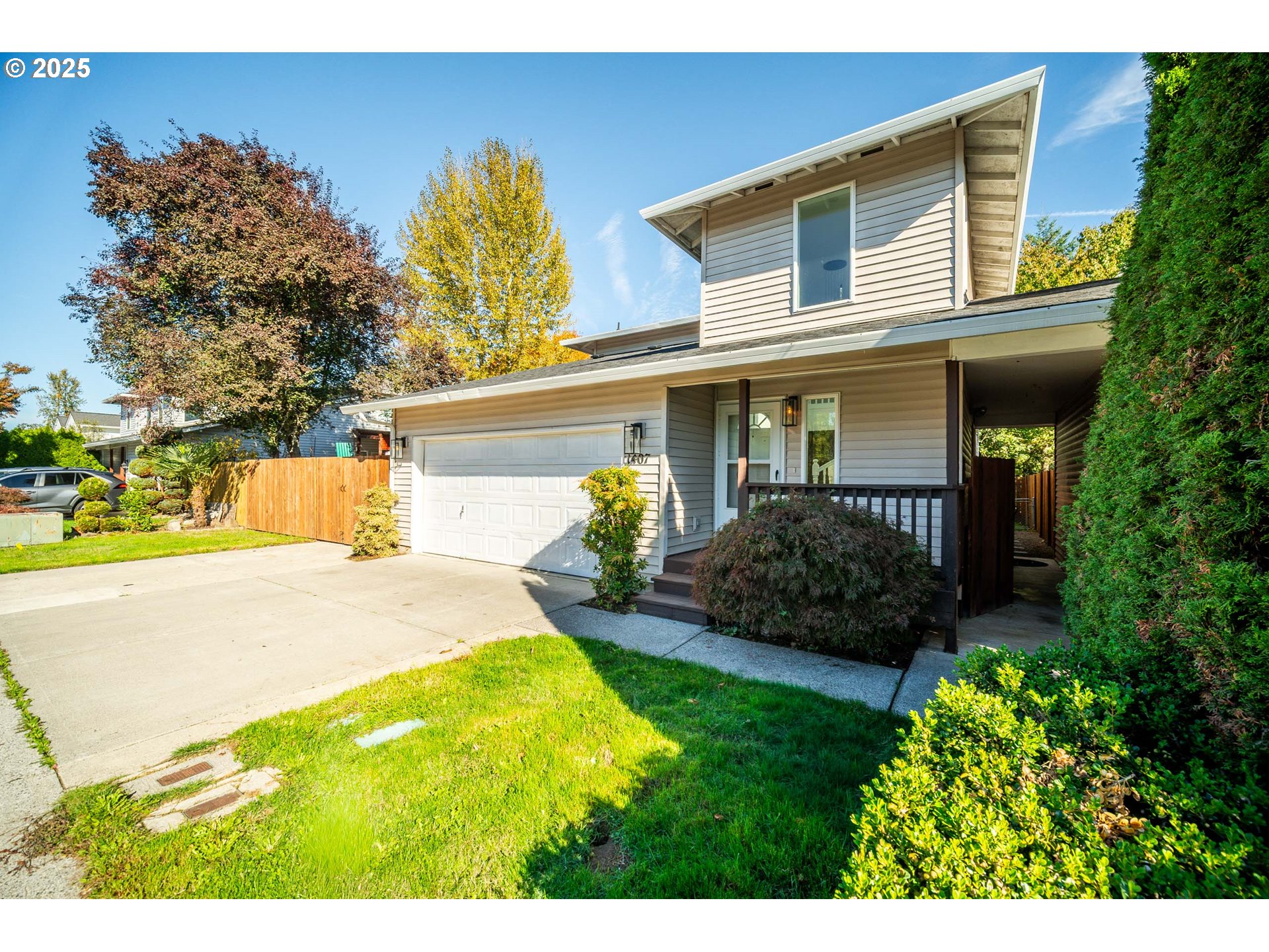 1407 Southwest 6th Avenue Battle Ground, WA 98604 - Photo 32 of 35 a front view of a house with garden