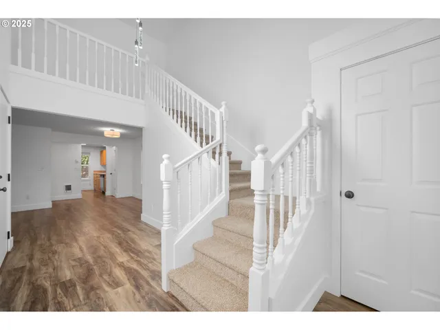 a view of a livingroom with wooden floor