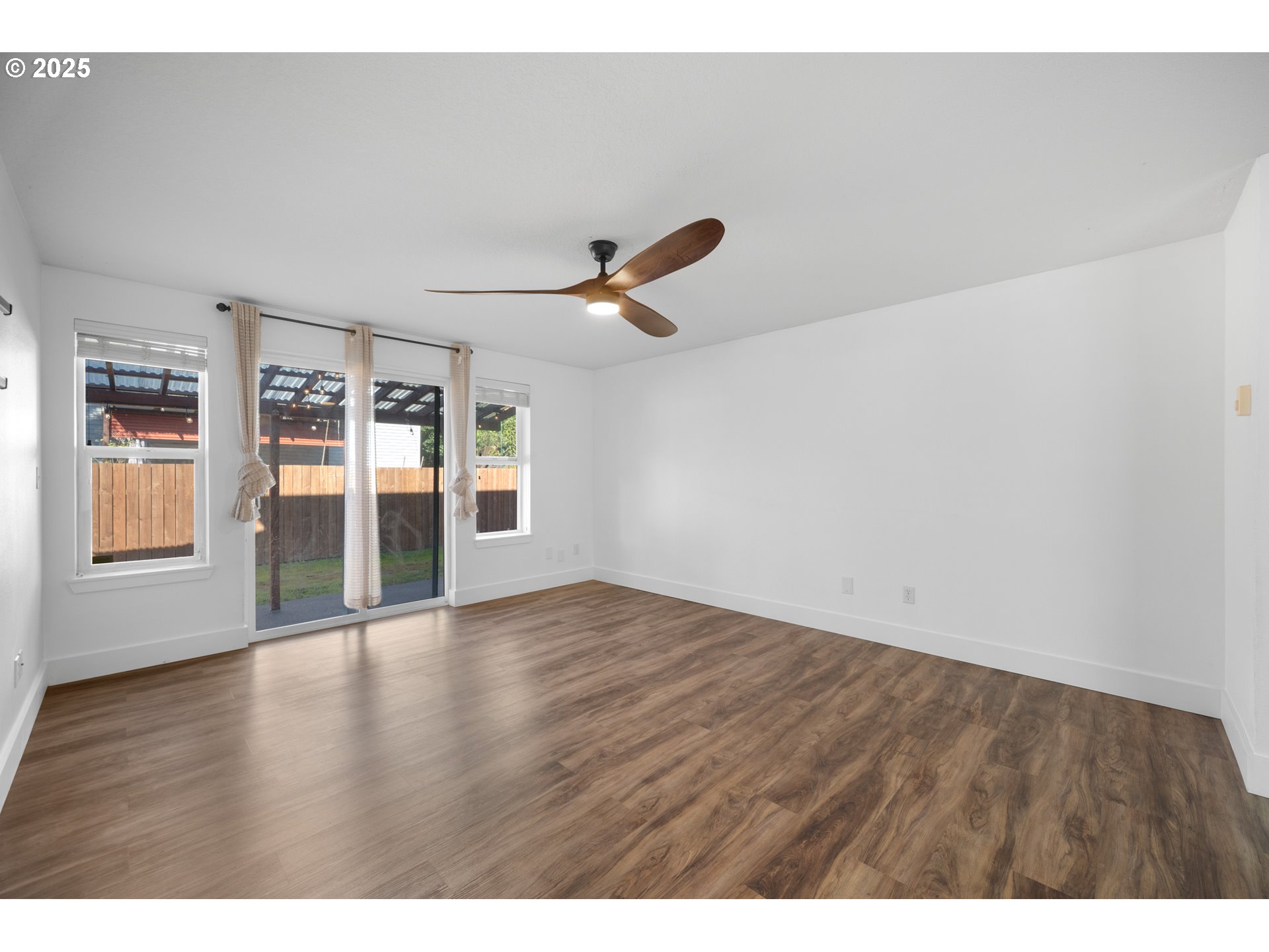 1407 Southwest 6th Avenue Battle Ground, WA 98604 - Photo 6 of 35 a view of an empty room with glass door