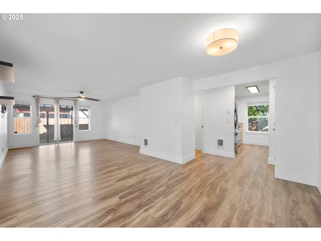 a kitchen with a stove microwave and sink