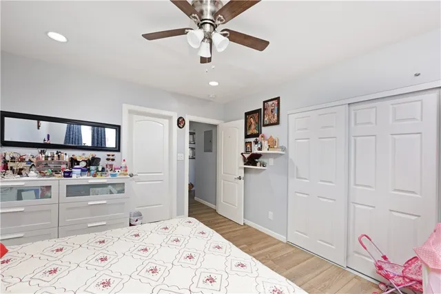 a room that has a bed and a dresser in it