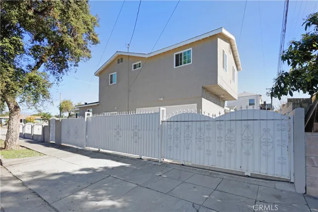 an aerial view of a house with a swimming pool