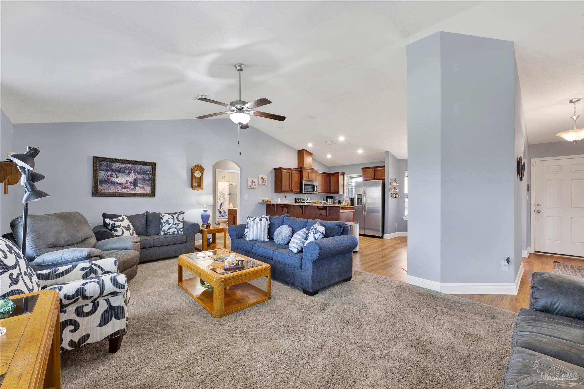 6336 Apple Ridge Circle Pensacola, FL 32526 - Photo 13 of 41 a living room with furniture and kitchen view