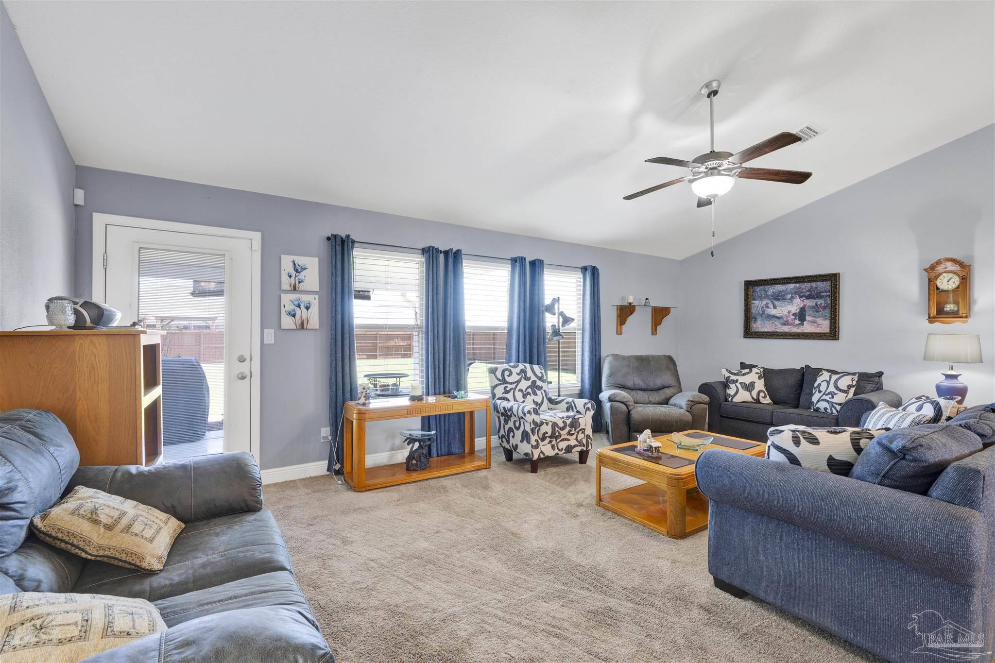 6336 Apple Ridge Circle Pensacola, FL 32526 - Photo 14 of 41 a living room with furniture and a large window