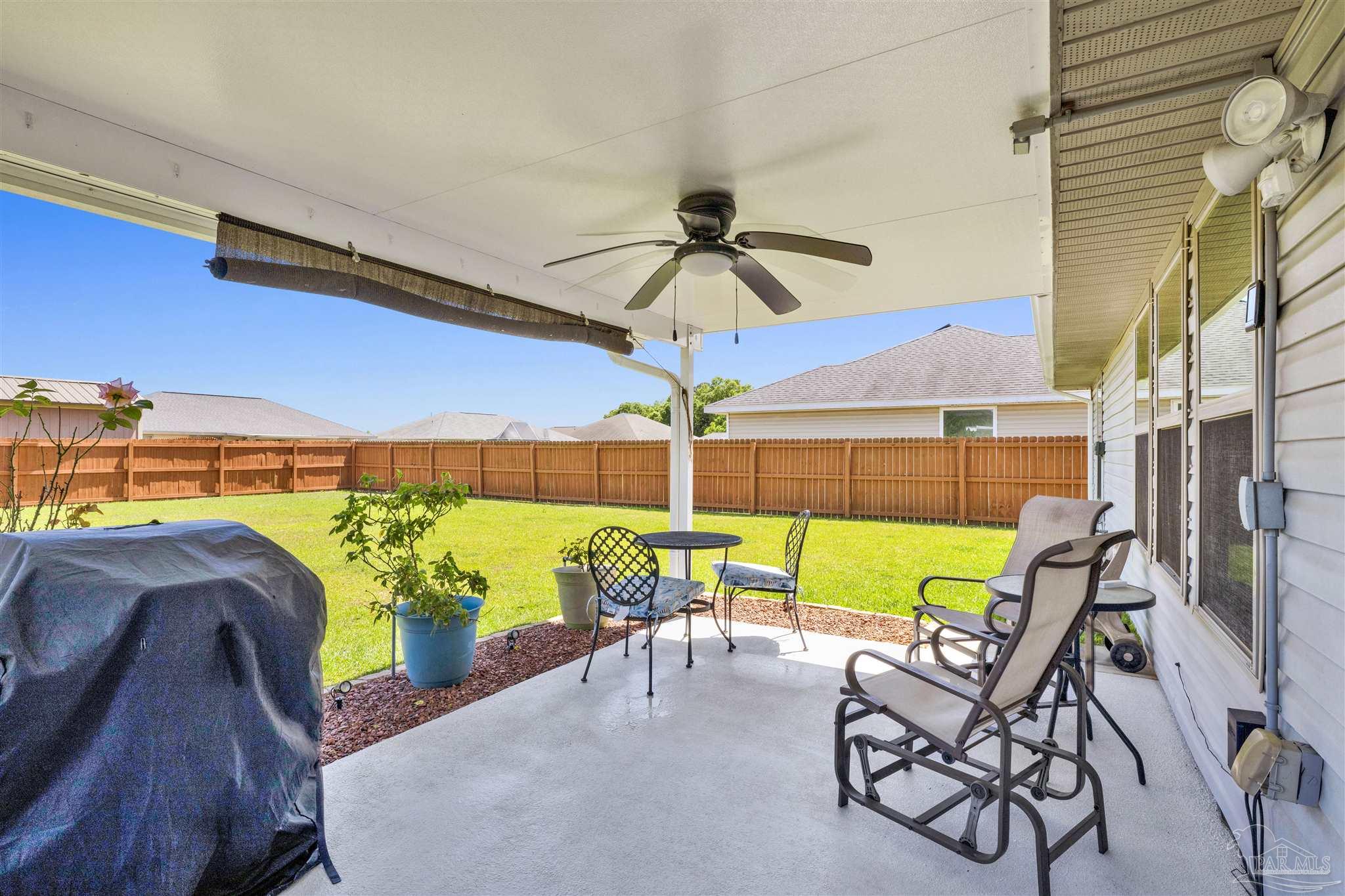 6336 Apple Ridge Circle Pensacola, FL 32526 - Photo 15 of 41 a view of an chairs and table in the patio