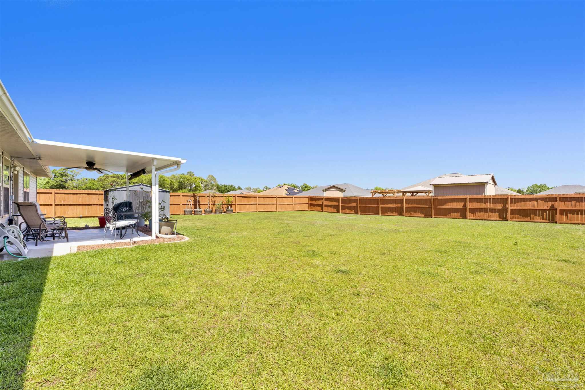 6336 Apple Ridge Circle Pensacola, FL 32526 - Photo 16 of 41 a view of a swimming pool and an outdoor seating