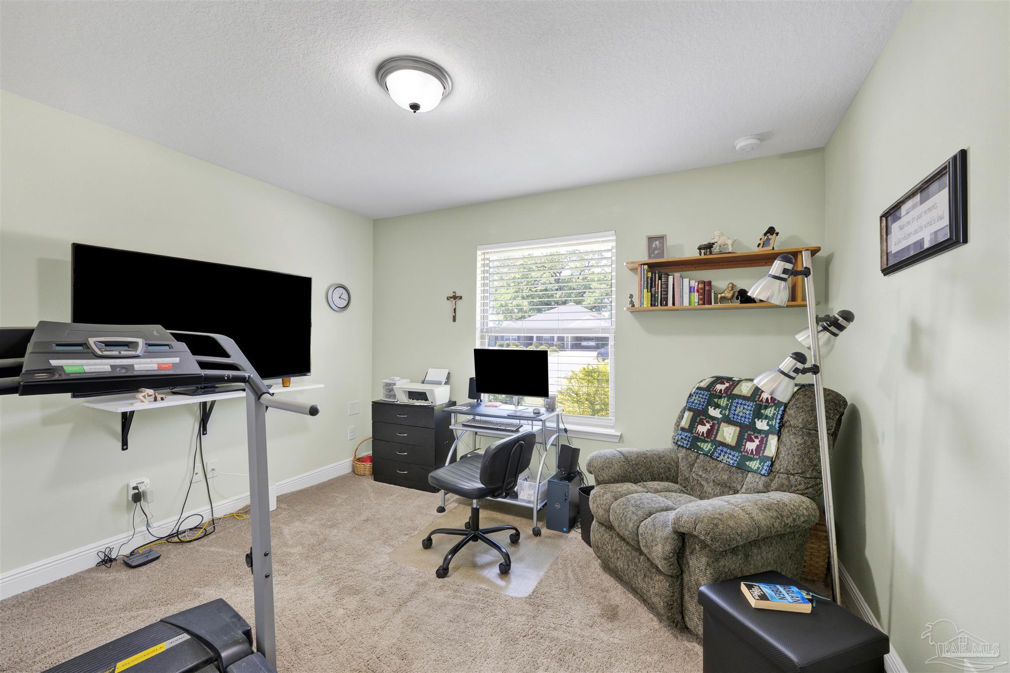 6336 Apple Ridge Circle Pensacola, FL 32526 - Photo 21 of 41 a view of a workspace with furniture and a window