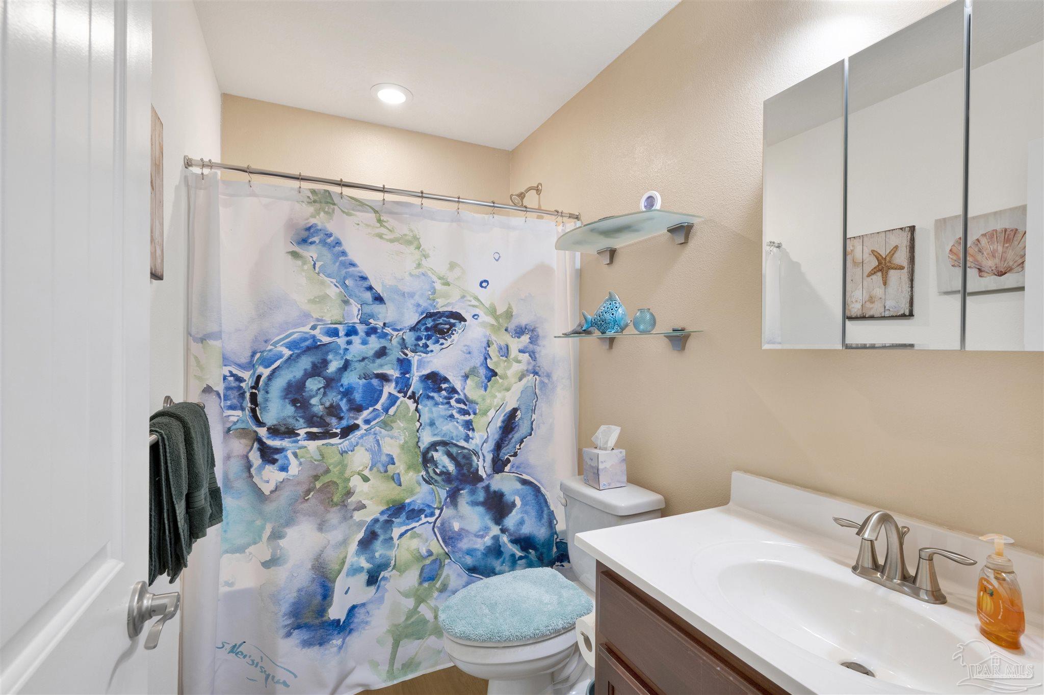 6336 Apple Ridge Circle Pensacola, FL 32526 - Photo 22 of 41 a bathroom with a sink toilet and shower