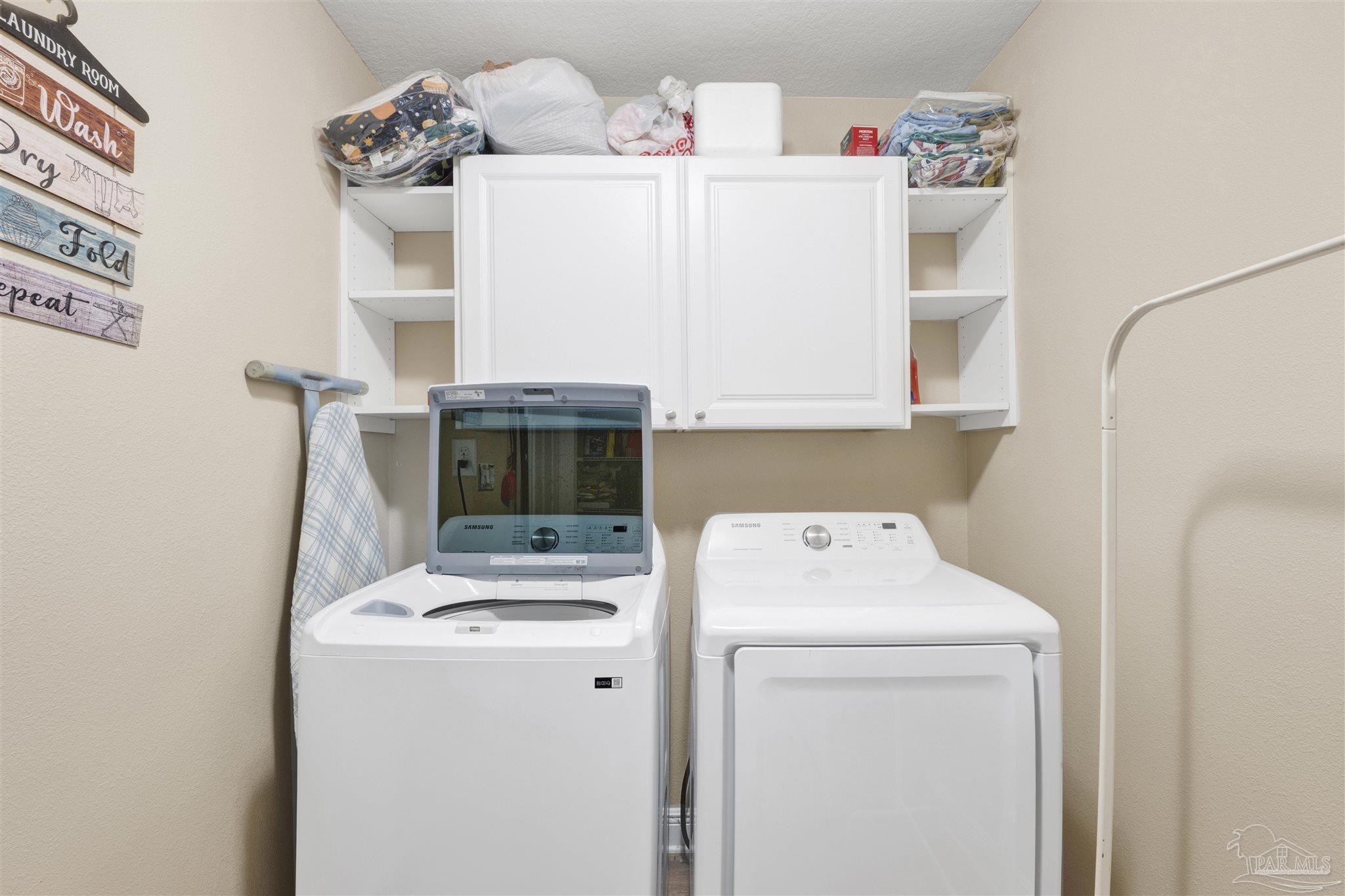 6336 Apple Ridge Circle Pensacola, FL 32526 - Photo 24 of 41 a utility room with dryer and washer