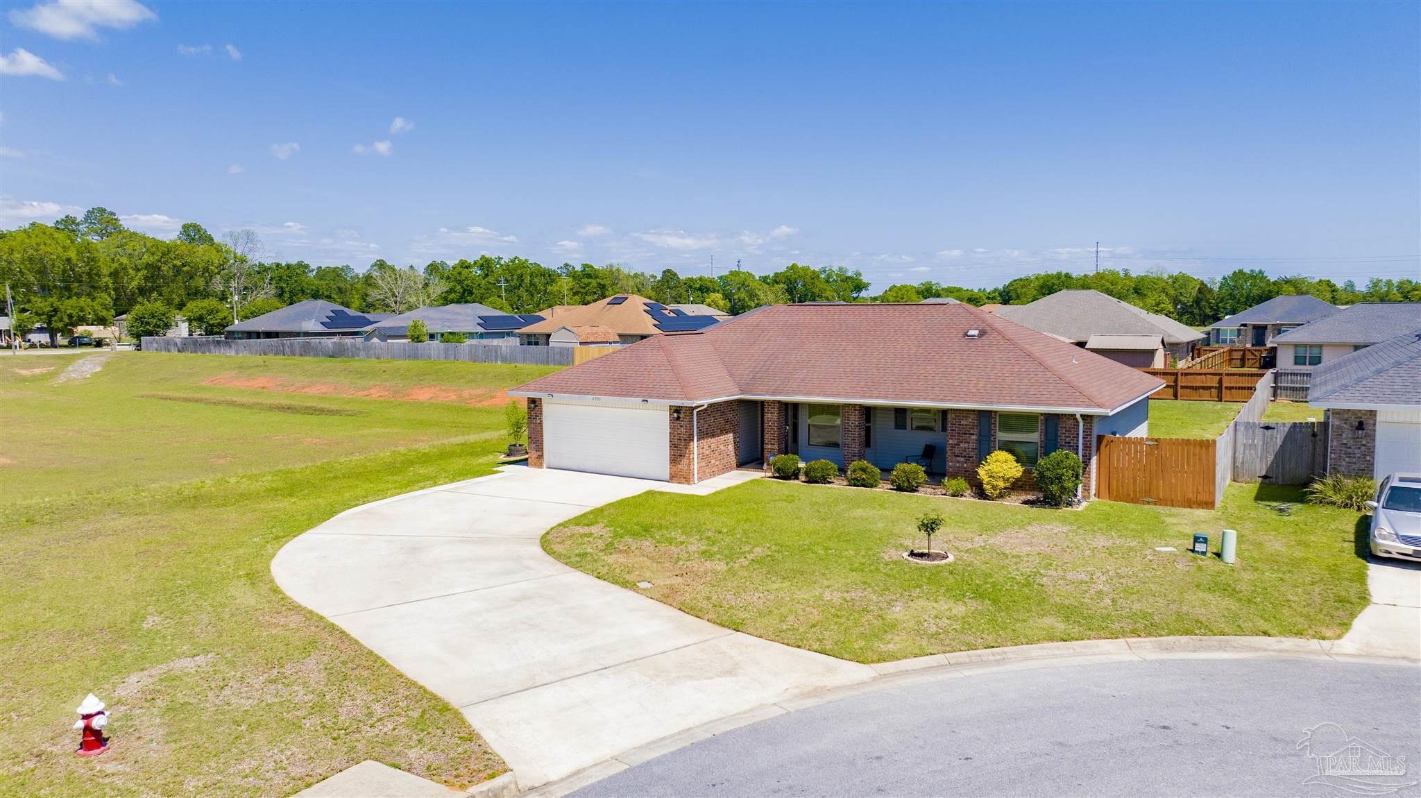 6336 Apple Ridge Circle Pensacola, FL 32526 - Photo 28 of 41 an aerial view of a house with a swimming pool outdoor seating and yard
