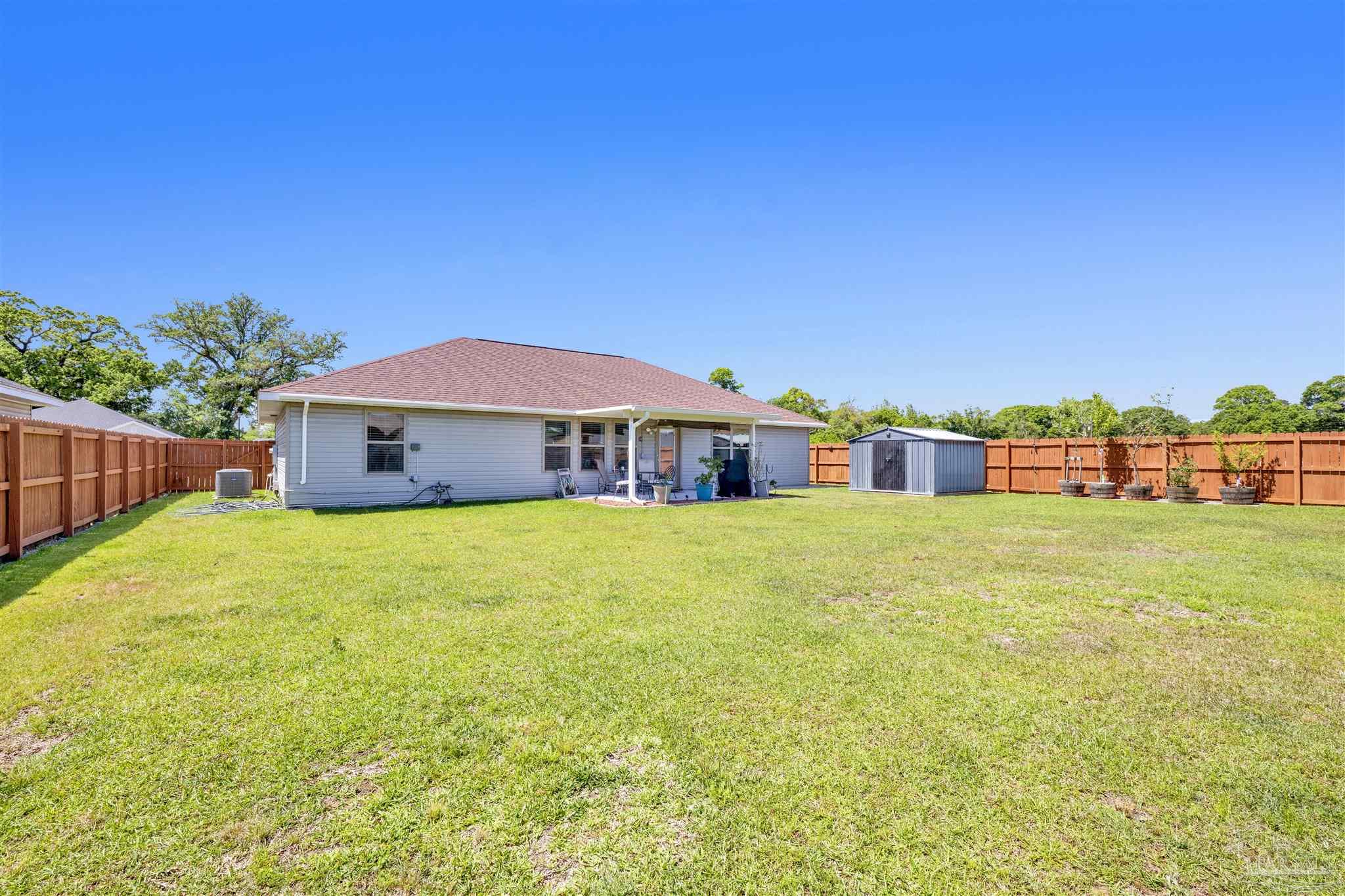 6336 Apple Ridge Circle Pensacola, FL 32526 - Photo 33 of 41 a front view of house with outdoor space and swimming pool