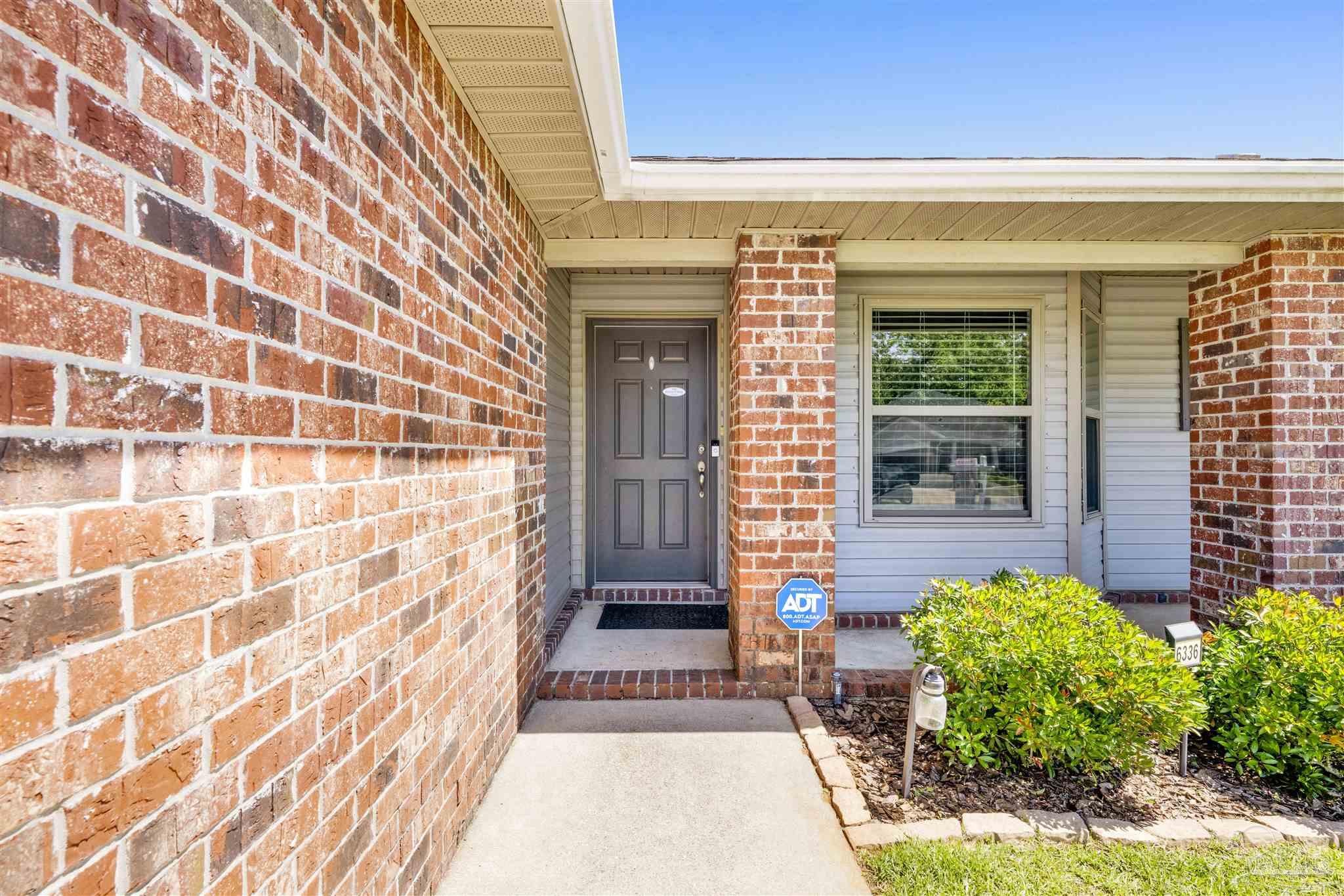6336 Apple Ridge Circle Pensacola, FL 32526 - Photo 4 of 41 a front view of a house