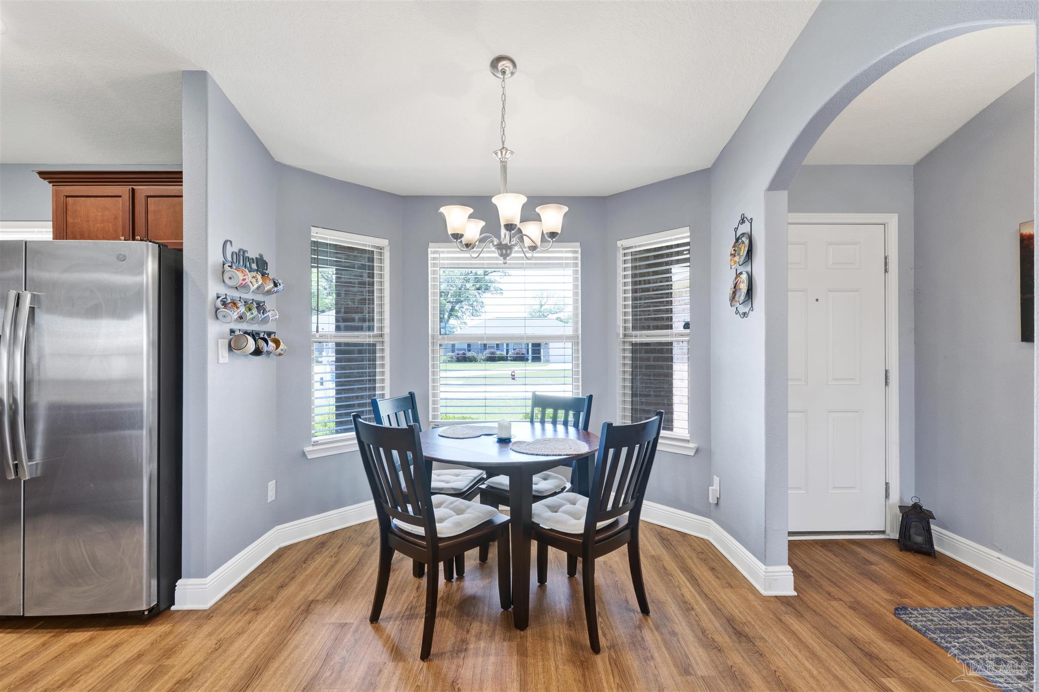 6336 Apple Ridge Circle Pensacola, FL 32526 - Photo 9 of 41 a view of a dining room with furniture window and outside view