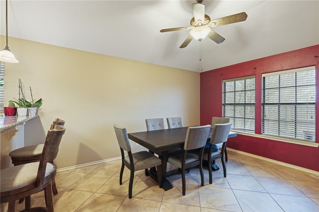 314 Hancock Odem, TX 78370 - Photo 14 of 30 a view of a dining room with furniture and a chandelier