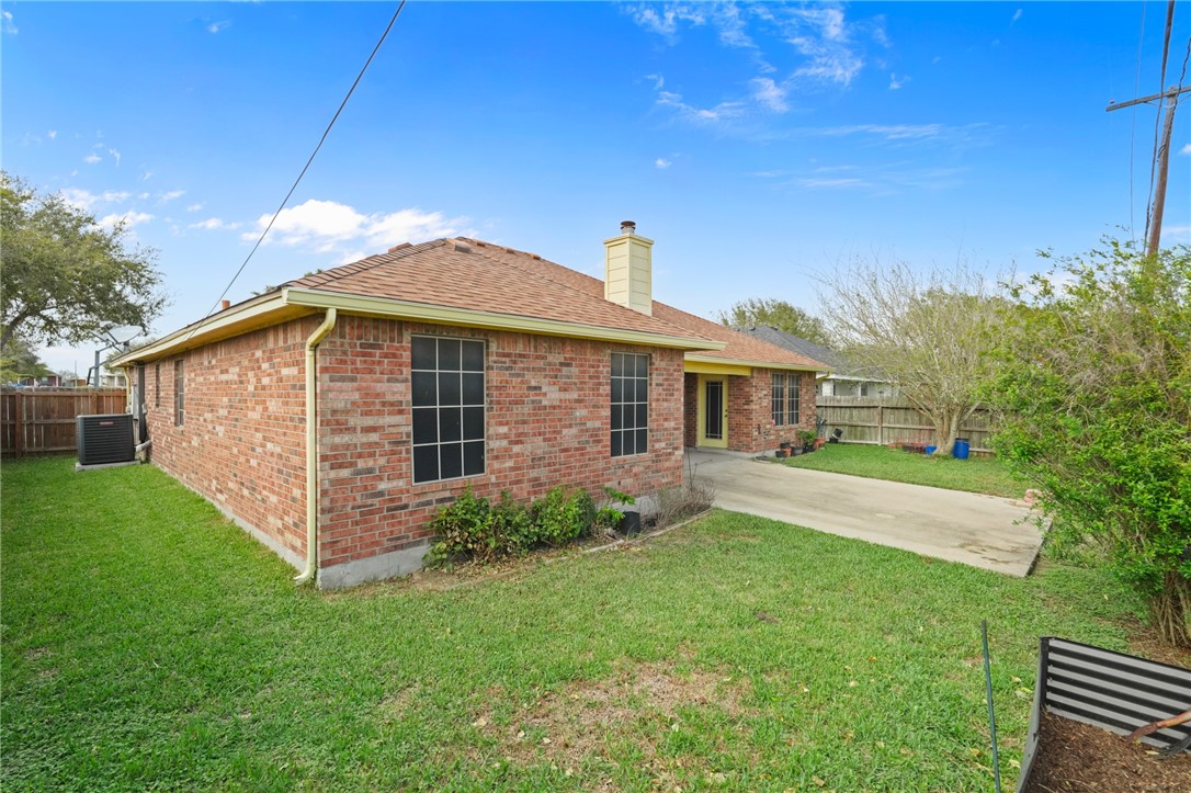 314 Hancock Odem, TX 78370 - Photo 7 of 30 a front view of a house with garden