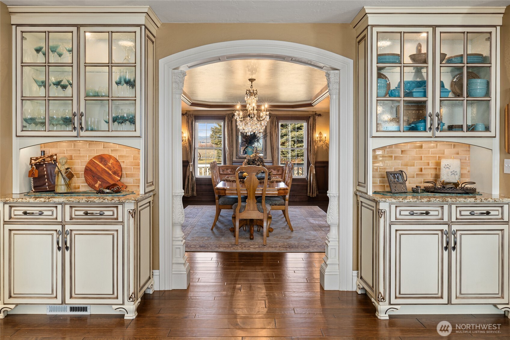 1800 Strande Road Ellensburg, WA 98926 - Photo 18 of 40 a view of a kitchen with granite countertop a stove and a wooden floors