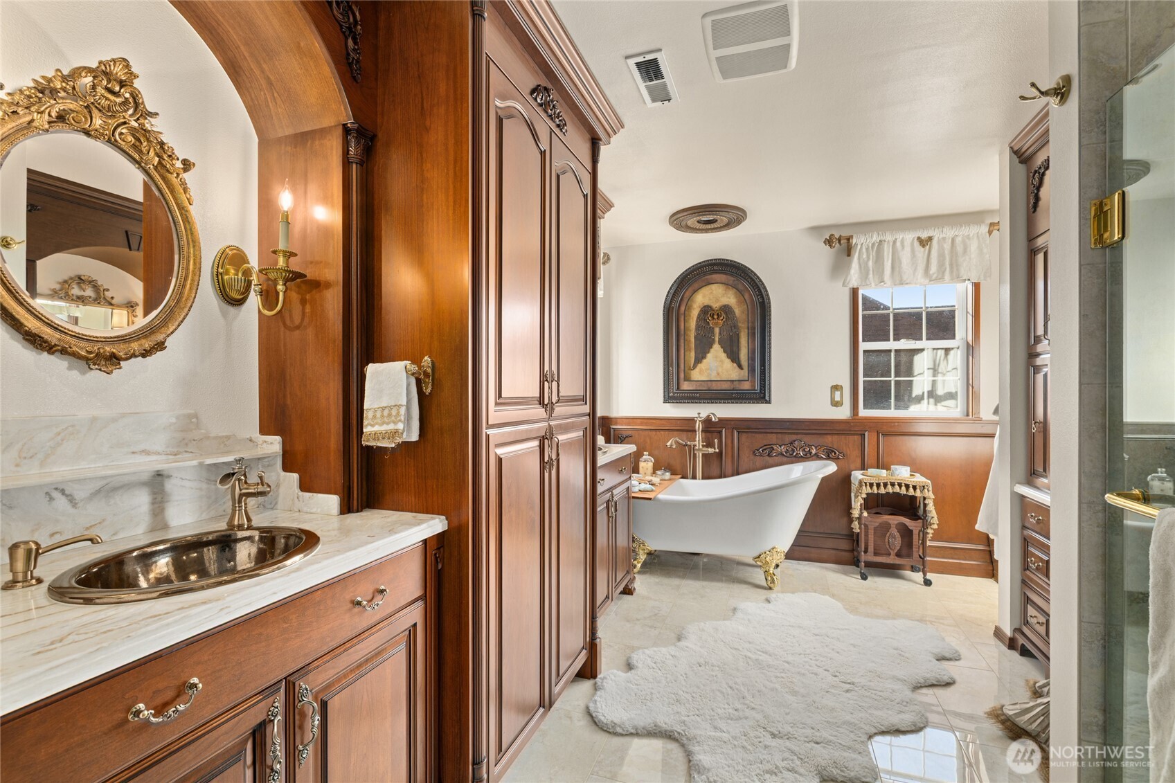 1800 Strande Road Ellensburg, WA 98926 - Photo 21 of 40 a bathroom with a sink a mirror and a window