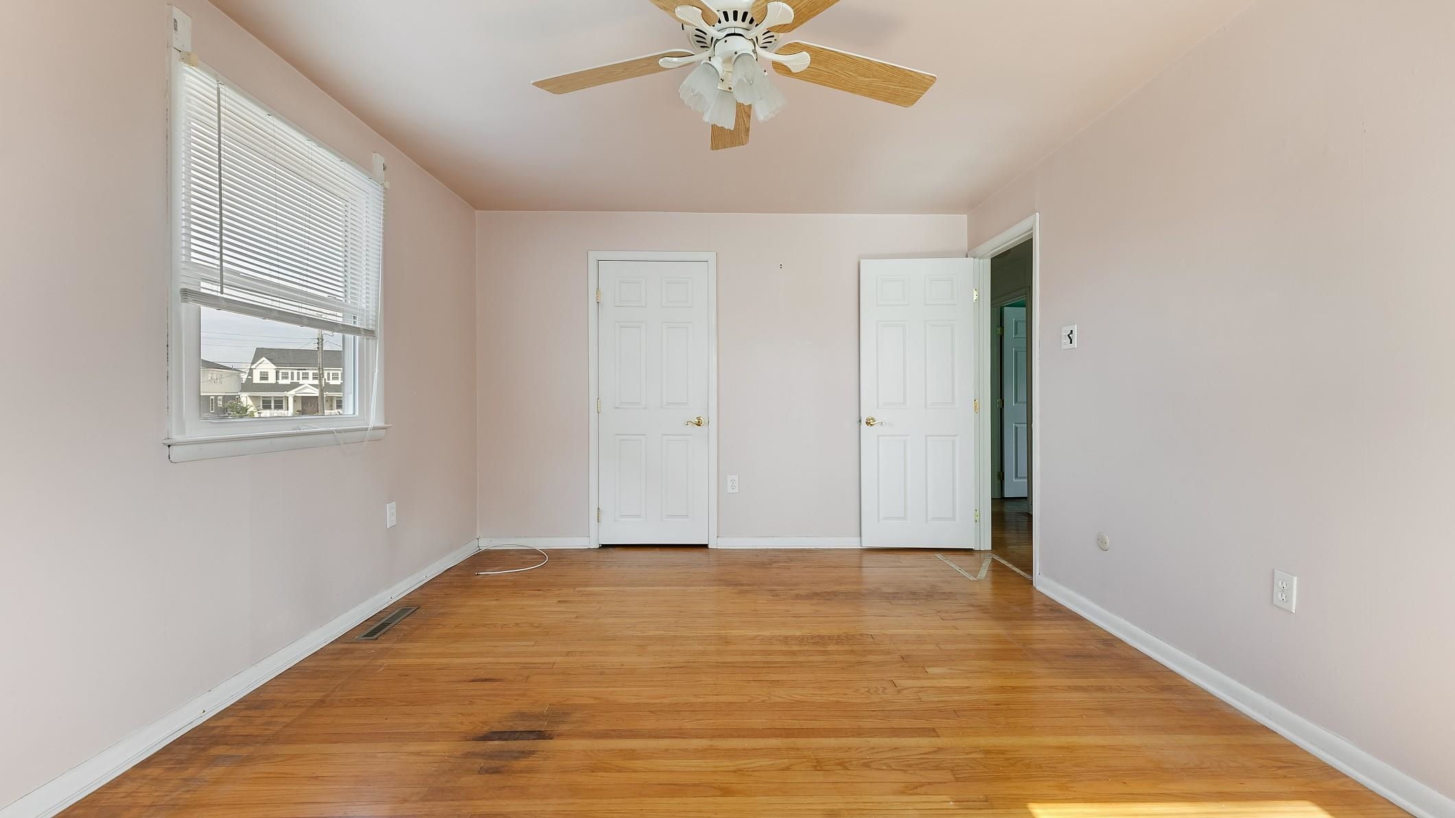 74 Walnut Road Ocean City, NJ 08226 - Photo 13 of 35 a view of an empty room with wooden floor