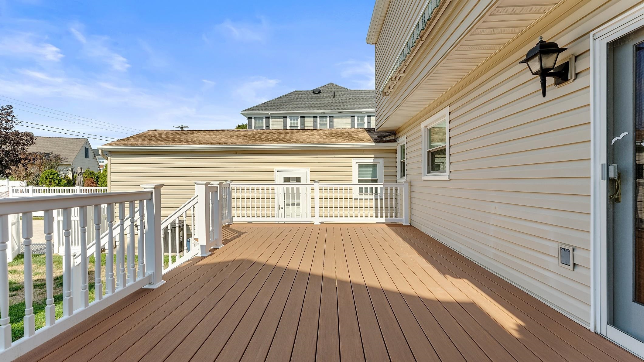 74 Walnut Road Ocean City, NJ 08226 - Photo 21 of 35 a view of a roof deck with wooden floor