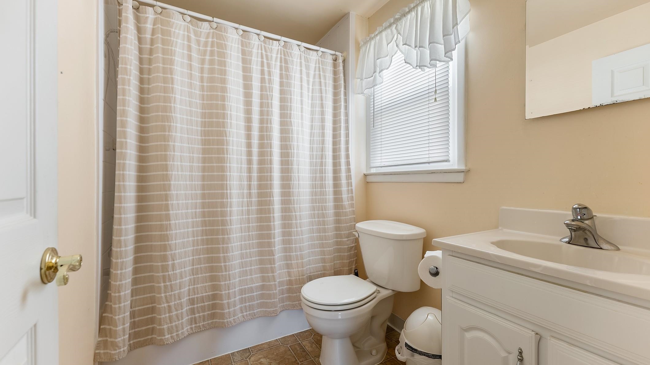 74 Walnut Road Ocean City, NJ 08226 - Photo 26 of 35 a bathroom with a toilet and a sink