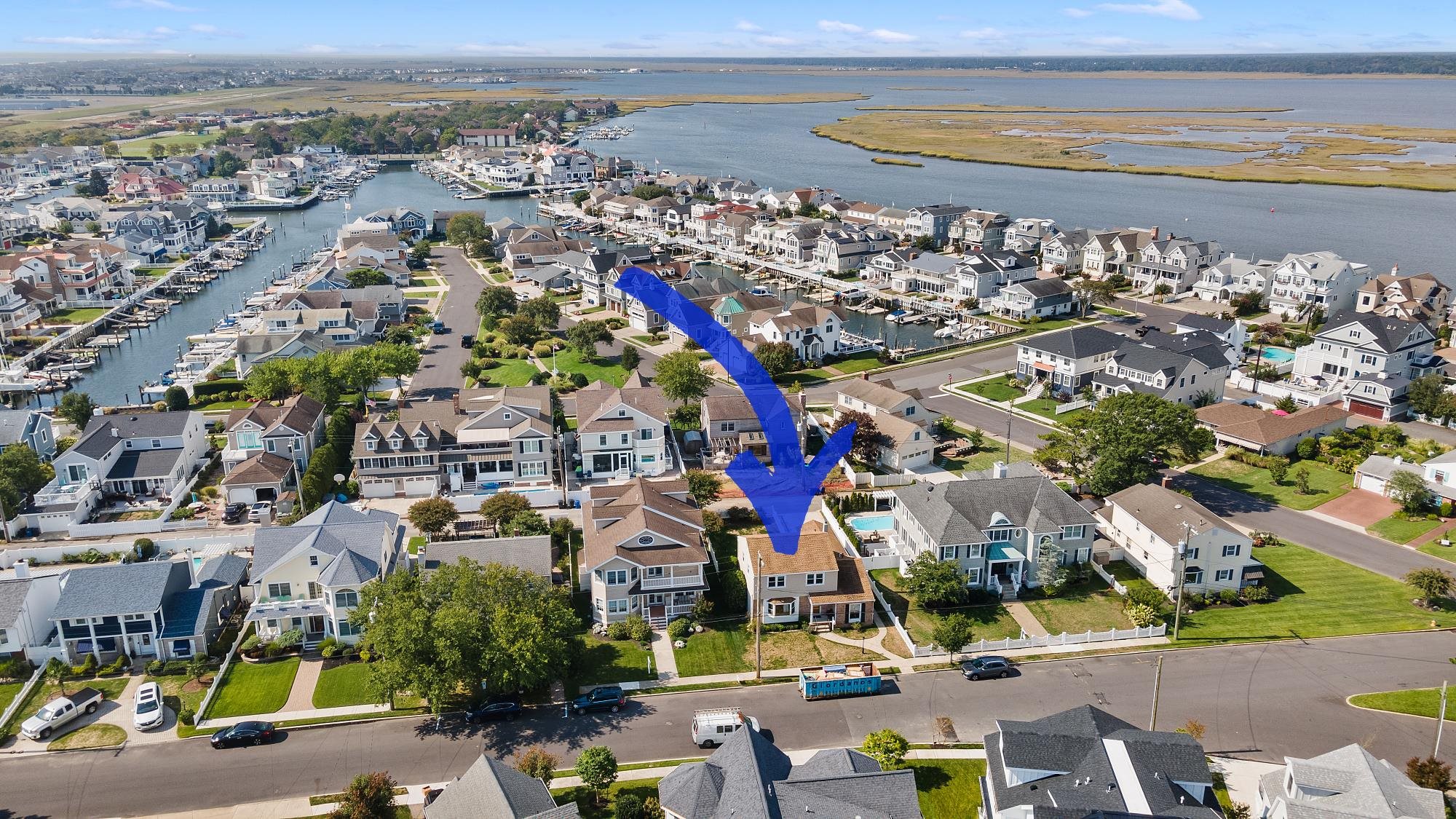 74 Walnut Road Ocean City, NJ 08226 - Photo 32 of 35 a view of multiple houses with a lake