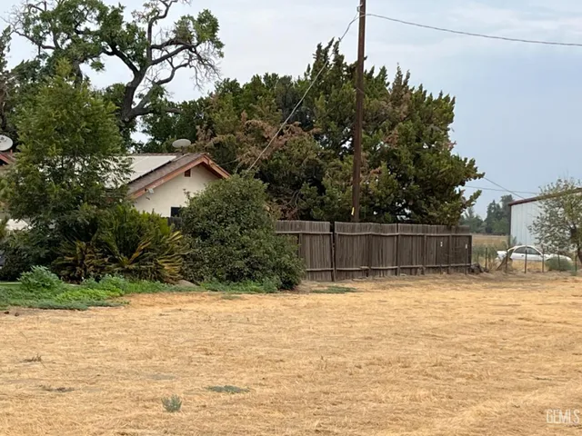 a house with a swimming pool in front of it