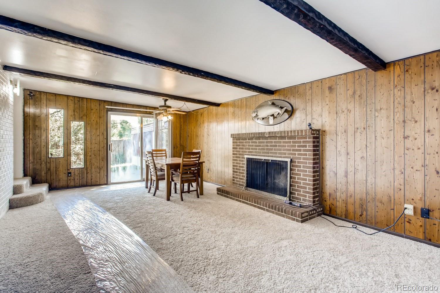 16060 Mt Vernon Road Golden, CO 80401 - Photo 14 of 29 a view of a livingroom with furniture and a fireplace