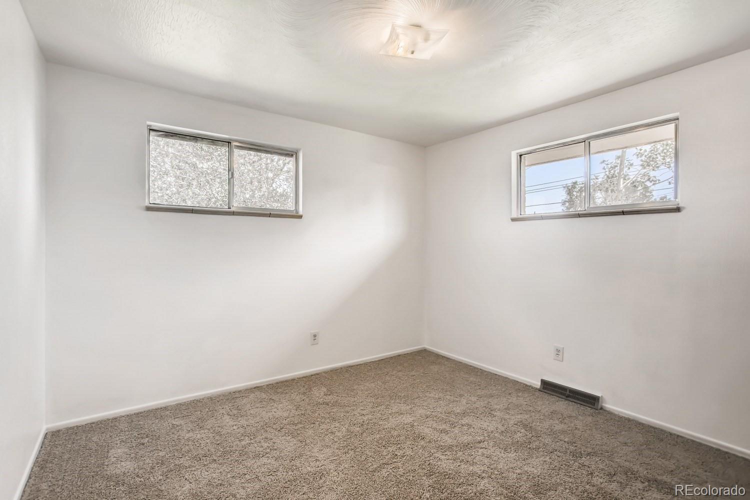 16060 Mt Vernon Road Golden, CO 80401 - Photo 19 of 29 an empty room with a window