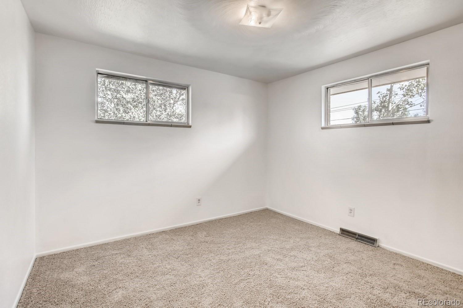 16060 Mt Vernon Road Golden, CO 80401 - Photo 21 of 29 a view of an empty room with a window