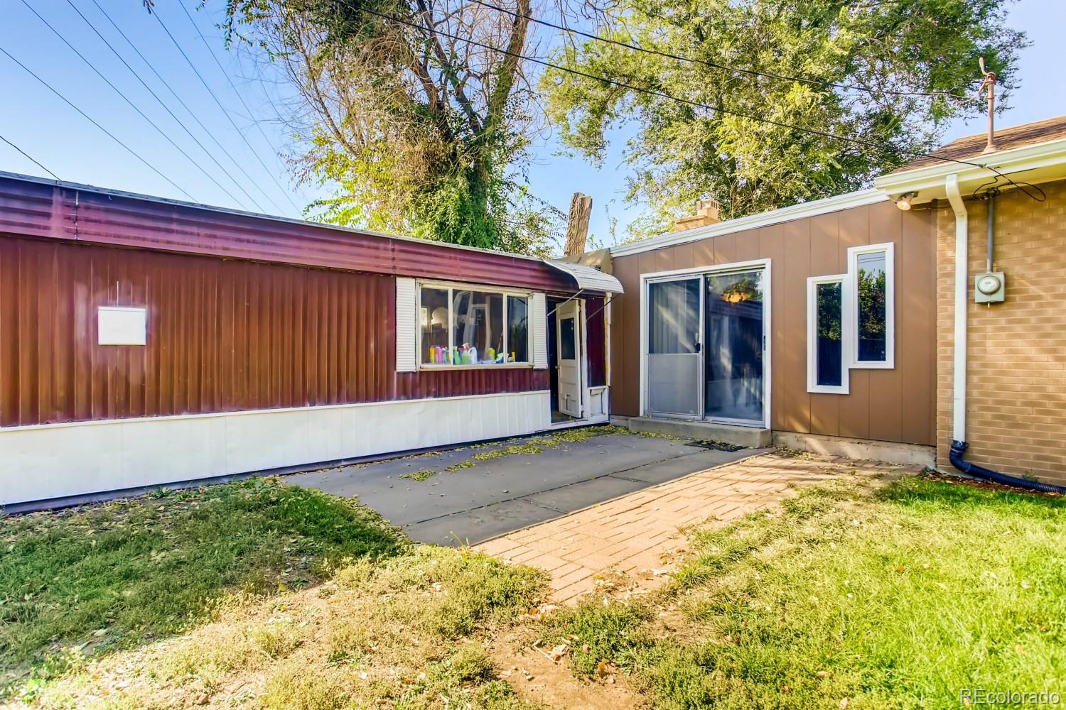 16060 Mt Vernon Road Golden, CO 80401 - Photo 27 of 29 a house with trees in the background