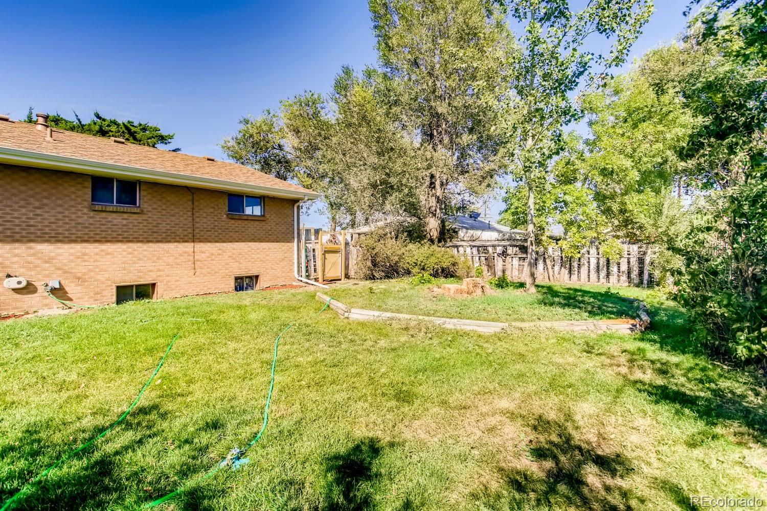 16060 Mt Vernon Road Golden, CO 80401 - Photo 29 of 29 a house view with swimming pool in front of it