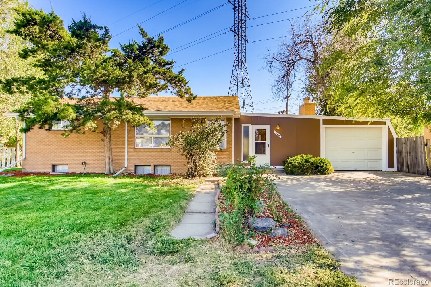 16060 Mt Vernon Road Golden, CO 80401 - Photo 5 of 29 front view of a house with a yard