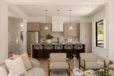 a bathroom with a white tub sink toilet and mirror
