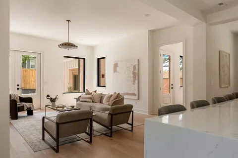 a bathroom with a bathtub a sink and a mirror