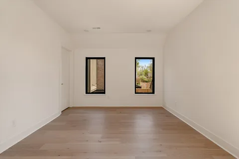 a view of house with backyard and deck