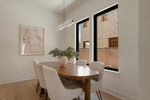 a view of a kitchen with a sink and cabinets