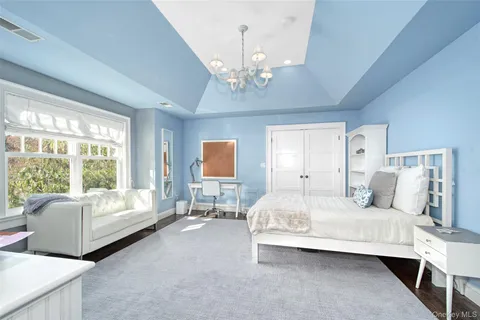 a bathroom with a tub and a shower