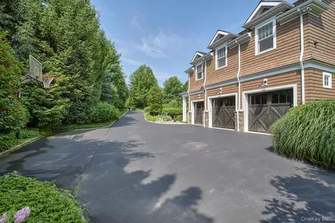 a view of a house with a small yard