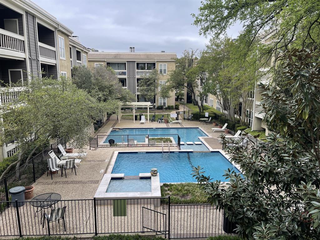 5310 Keller Springs Road, Unit 423 Dallas, TX 75248 - Photo 1 of 7 Community pool featuring a patio