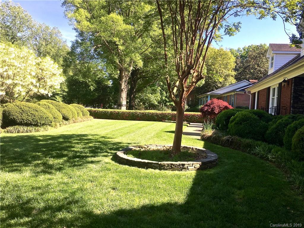 6418 Sardis Road Charlotte, NC 28270 - Photo 2 of 35 a view of a backyard with plants and lake