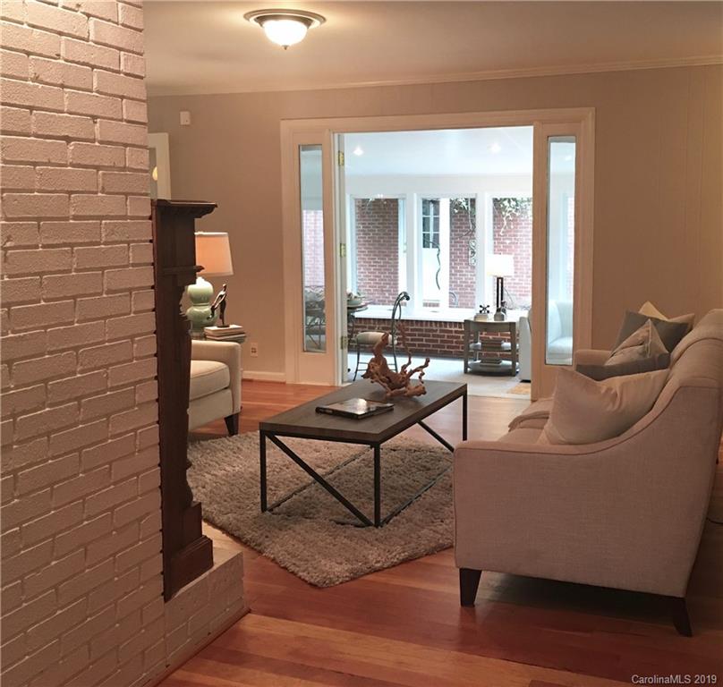 6418 Sardis Road Charlotte, NC 28270 - Photo 12 of 35 a living room with furniture and wooden floor