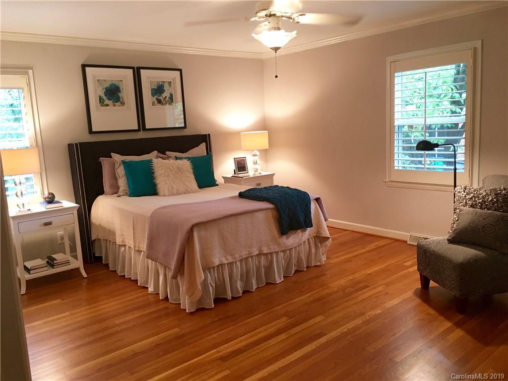 6418 Sardis Road Charlotte, NC 28270 - Photo 20 of 35 a bedroom with a bed and a couch