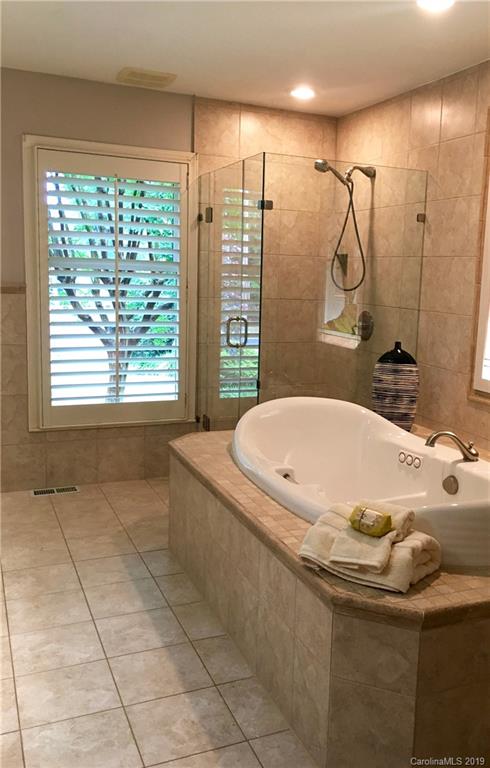 6418 Sardis Road Charlotte, NC 28270 - Photo 24 of 35 a bathroom with a granite countertop sink a toilet and shower